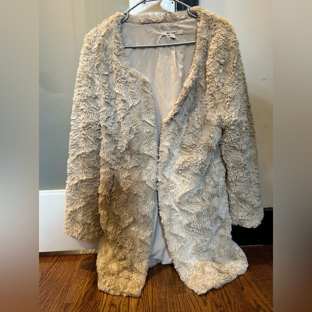 Beige furry throw coat
